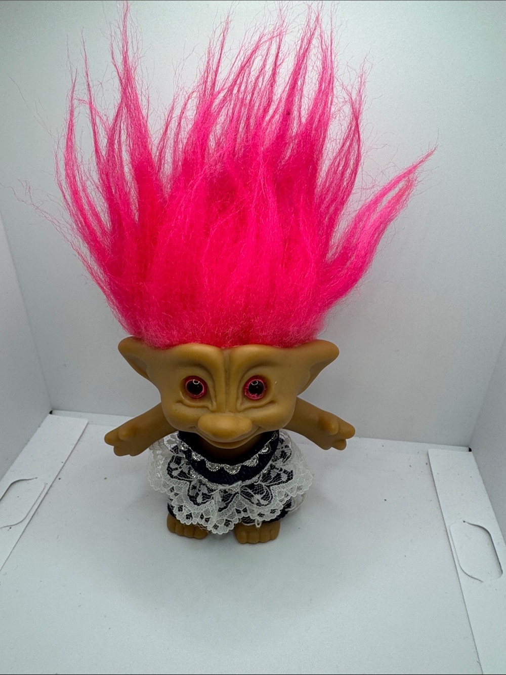Vintage troll doll with pink Hair.